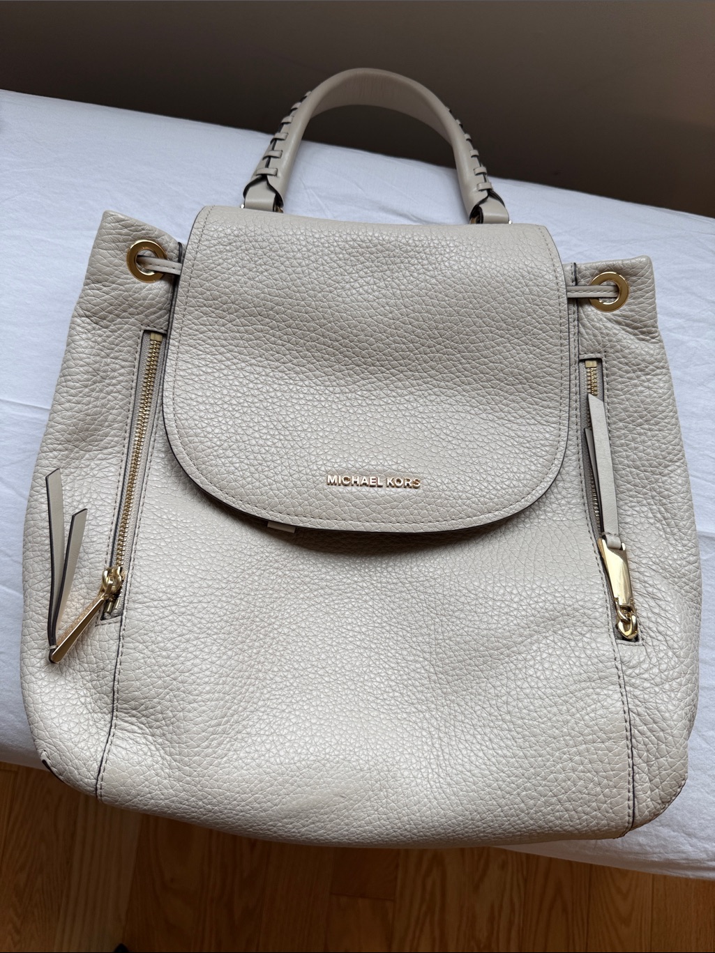 Michael Kors Cream Pebbled Leather Drawstring Backpack With Gold Hardware